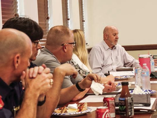 City talks wage hike