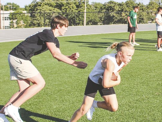 Hornet football camp unites coaches, preps future gridders