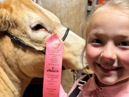 Third grader holds her own at stock show