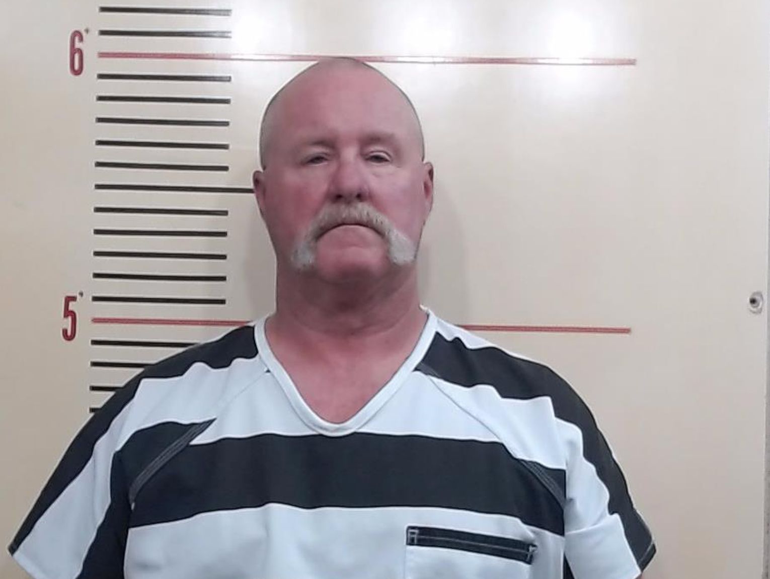 Former firefighter charged with indecent exposure