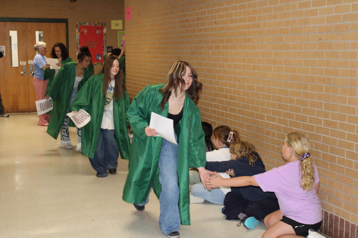 AHS seniors walk Cross Timbers Elementary