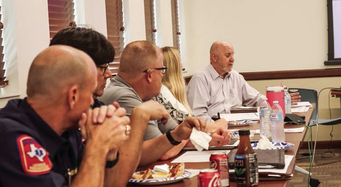 City talks wage hike