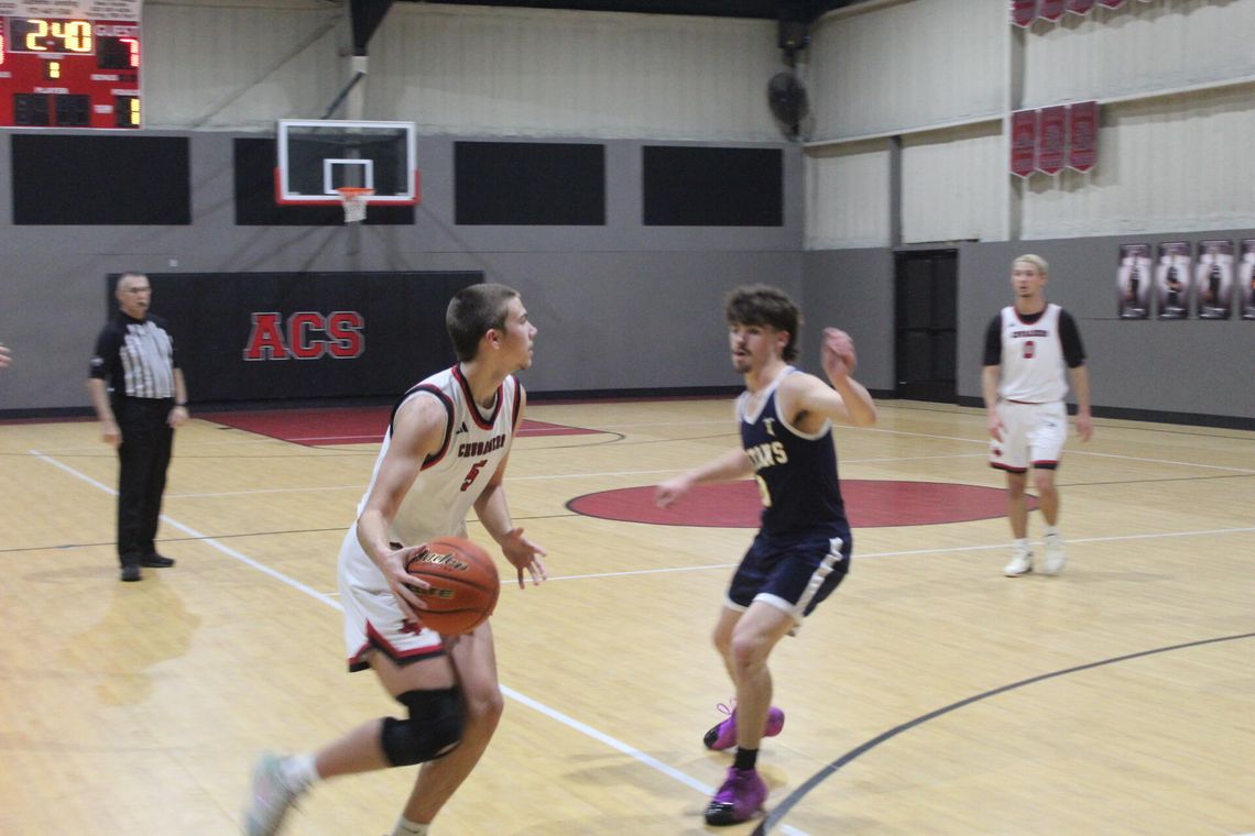 Fighting Crusaders roll past Titan Academy at home