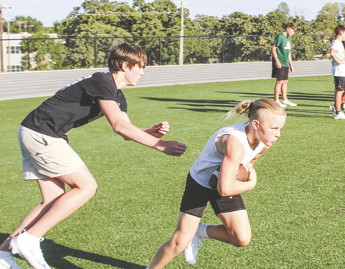 Hornet football camp unites coaches, preps future gridders