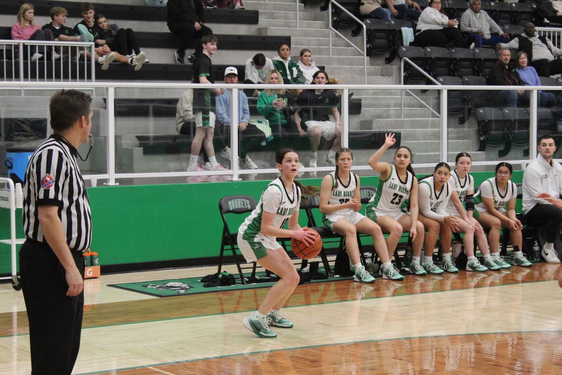 Late heroics lift Hornets; Ladies split busy district week